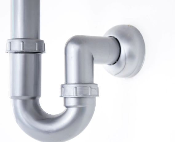 platinum piping attached to a white wall